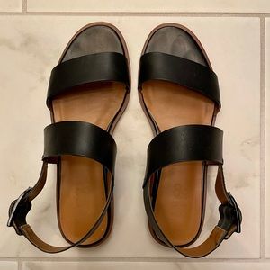 Black strappy sandals.